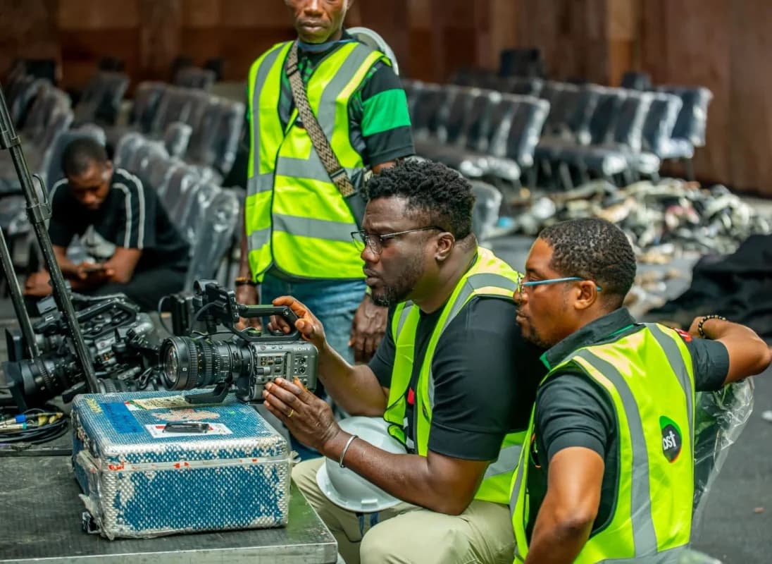 IBST Media production team preparing camera equipment